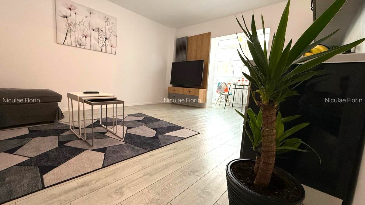 Apartament 3 camere de închiriat zona Unirii| Modern, spațios, parcare inclusă