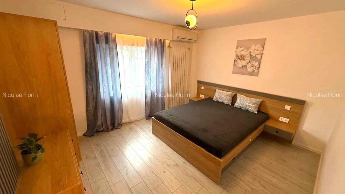 Apartament 3 camere de închiriat zona Unirii| Modern, spațios, parcare inclusă